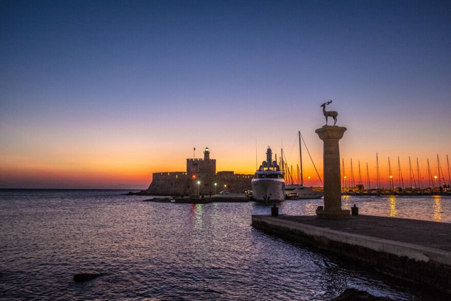 Windmills At Mandraki Harbour In Rhodes Island